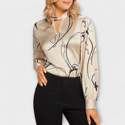 Blouse élégante avec motif à rayures et détail en trou de serrure