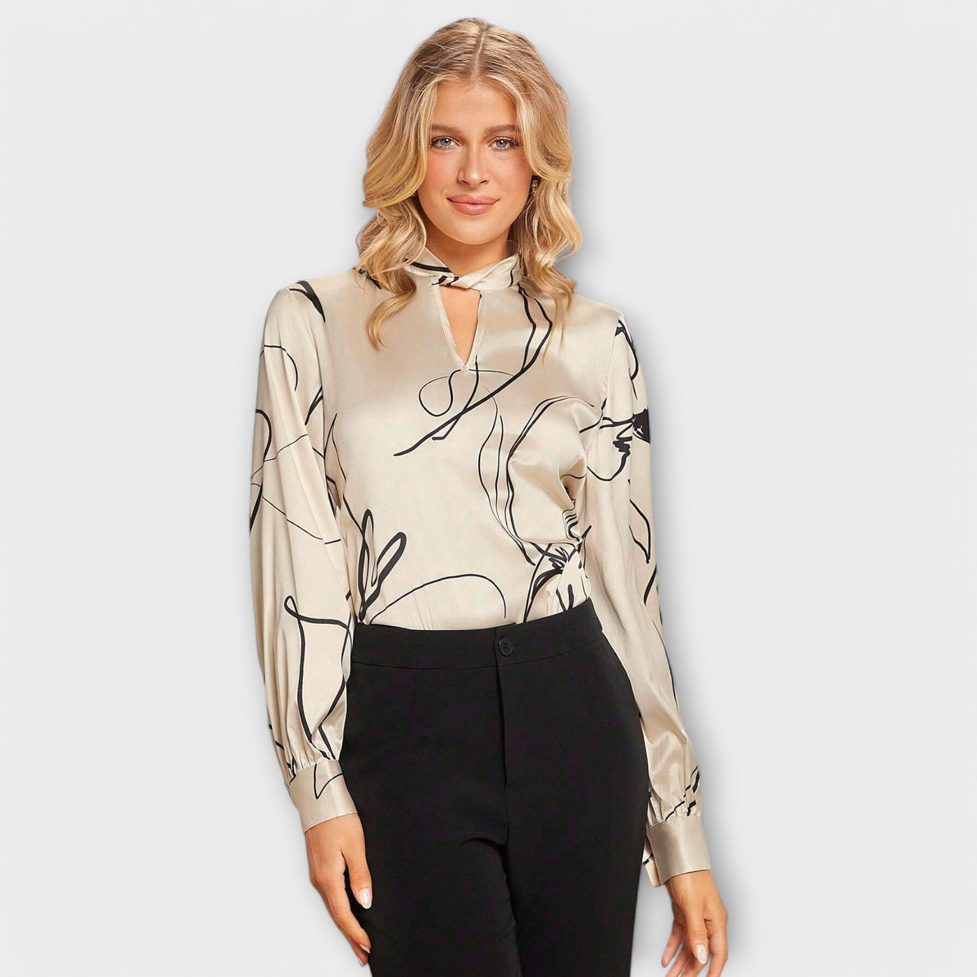 Blouse élégante avec motif à rayures et détail en trou de serrure