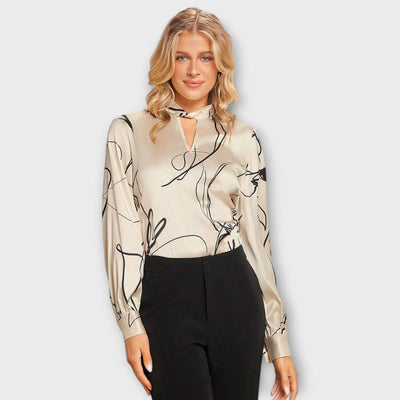 Blouse élégante avec motif à rayures et détail en trou de serrure