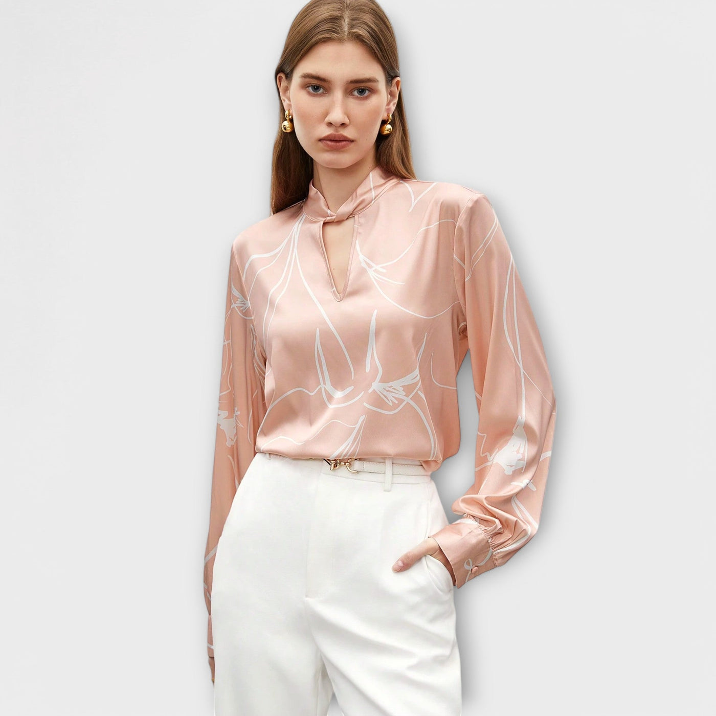 Blouse élégante avec motif à rayures et détail en trou de serrure