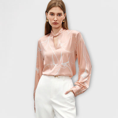 Blouse élégante avec motif à rayures et détail en trou de serrure