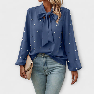 Sophia – Blouse élégante avec détails en perles et nœud