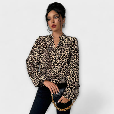 Blouse élégante à imprimé léopard avec décolleté en V