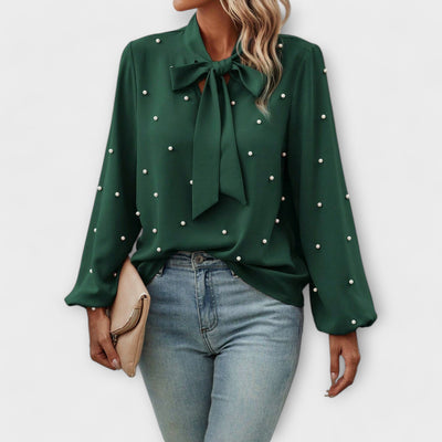 Sophia – Blouse élégante avec détails en perles et nœud