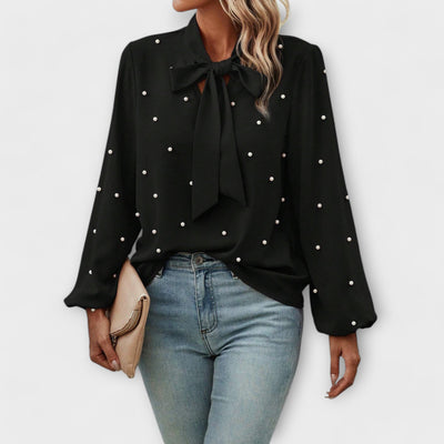 Sophia – Blouse élégante avec détails en perles et nœud