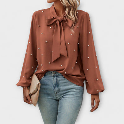 Sophia – Blouse élégante avec détails en perles et nœud