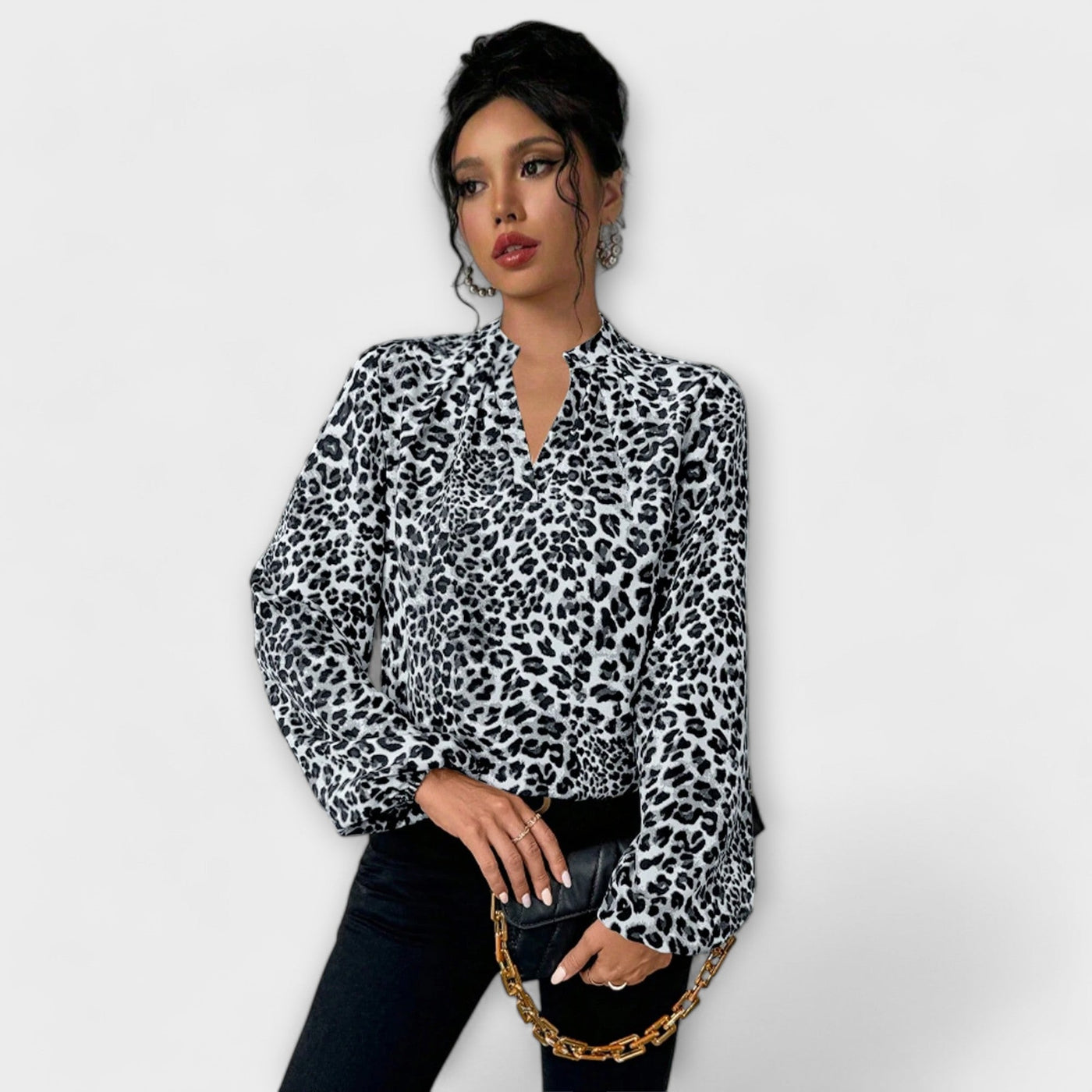 Blouse élégante à imprimé léopard avec décolleté en V