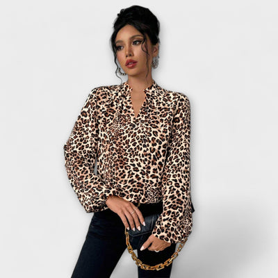 Blouse élégante à imprimé léopard avec décolleté en V