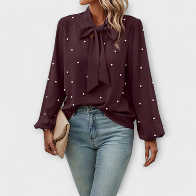 Sophia – Blouse élégante avec détails en perles et nœud