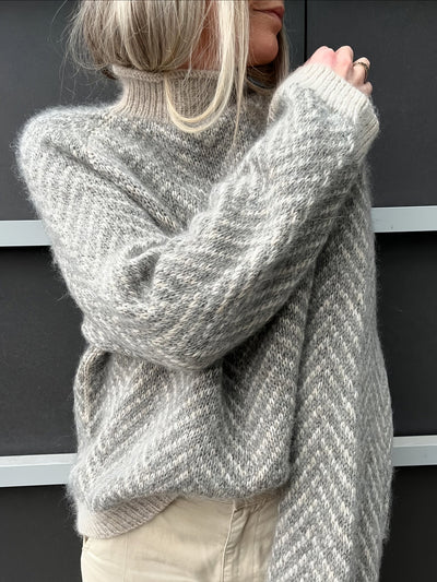 Éva – Pull col roulé délicat