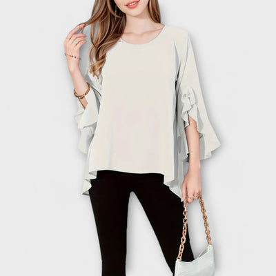 Aria – La Blouse Parfaite de Printemps avec Col Rond